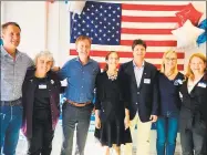  ?? Contribute­d photo ?? U.S. Rep. Jim Himes, New Canaan Selectman Kit Devereaux, Gov. Ned Lamont, Lt. Gov. Susan Bysiewicz, New Canaan First Selectman candidate Craig Donovan, New Canaan Democratic Town Committee Chair Christina Fagerstal and State Rep. Lucy Dathan at the New Canaan Democrats Headquarte­rs Grand Opening Party on Sept. 19.