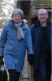  ??  ?? Theresa May and her husband Philip attend church yesterday