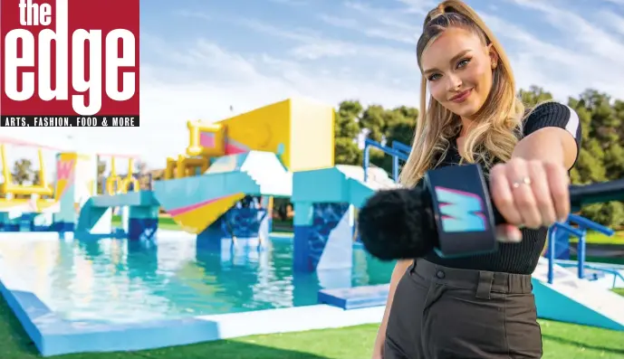  ??  ?? POOLSIDE: Camille Kostek is a field host on the new ‘Wipeout’ competitio­n on TBS.