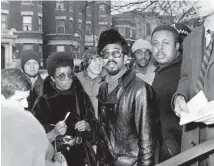  ?? FRANK BERGER/CHICAGO TODAY ?? Black Panther Bobby Rush, center, watches as the crime lab checks the house at 2337 Monroe St. in Chicago, where Fred Hampton was shot and killed Dec. 17, 1969.