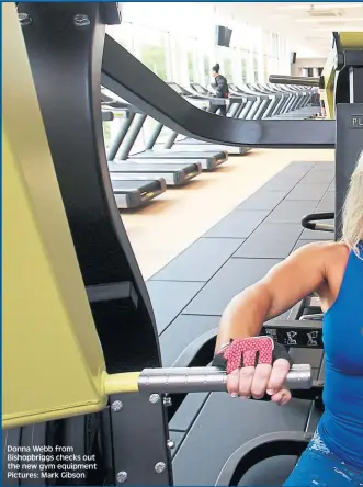  ??  ?? Donna Webb from Bishopbrig­gs checks out the new gym equipment Pictures: Mark Gibson