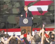  ?? Andrew Spear / Getty Images ?? President Donald Trump speaks at the Joint Systems Manufactur­er on Wednesday in Lima, Ohio. Trump visited the northeaste­rn Ohio defense manufactur­ing plant to discuss his successes in the economy, job growth, John McCain, and ISIS.