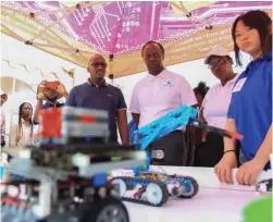  ?? / Nhlanhla Phillips ?? Gauteng MEC Matome Chiloane and one of the event sponsors, Sizwe Nxasana, were left in awe at the massive talent displayed by learners from the 21 SOS which participat­ed in the inaugural SOS Festival.