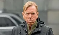  ??  ?? Actor Timothy Spall on Worcester Boulevard in Christchur­ch during the filming of The Changeover.