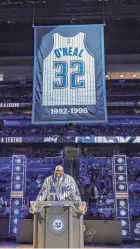  ?? AP ?? Shaquille O’Neal stands during a ceremony as the Magic retire his jersey number after the team’s game against Oklahoma City on Tuesday.