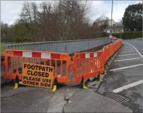  ??  ?? Almost two-years after this Fermoy footpath collapsed locals councillor­s are furious that Transport Infrastruc­ture Ireland have yet to repair it .
Pic courtesy of Avondhupre­ss.