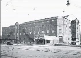  ?? VANCOUVER PUBLIC LIBRARY PHOTO NO. 6549 ?? Denman Arena, a large wooden structure, opened in 1911 and burned down in 1936.