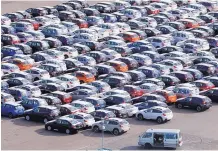  ?? KOJI SASAHARA/ASSOCIATED PRESS ?? Cars for export are parked at a port in Kawasaki, west of Tokyo. President Trump has launched an investigat­ion on whether tariffs are needed on vehicles and automotive parts imported into the U.S.