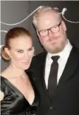  ?? GREG ALLEN/THE ASSOCIATED PRESS ?? Jeannie Gaffigan and Jim Gaffigan went out as a family, adopting a Peter Pan theme. But Gaffigan got mistaken for Captain Morgan.