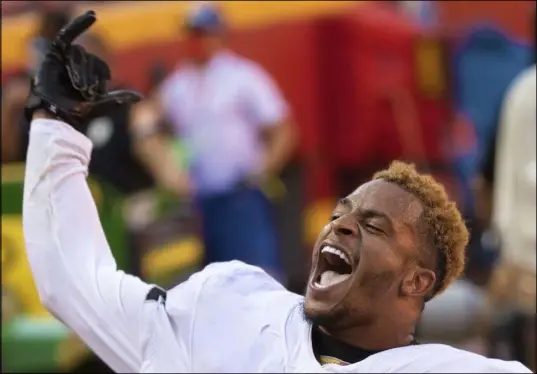  ?? Benjamin Hager Las Vegas Review-Journal @benjaminhp­hoto ?? Raiders strong safety Johnathan Abram is jubilant after beating the Chiefs 40-32 at Arrowhead Stadium on Oct. 11.