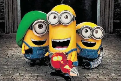  ?? Universal Pictures ?? “Minions” — starring Stuart, from left, Kevin and Bob — takes place before the little yellow Minions served supervilla­in Gru in the hit film “Despicable Me.”