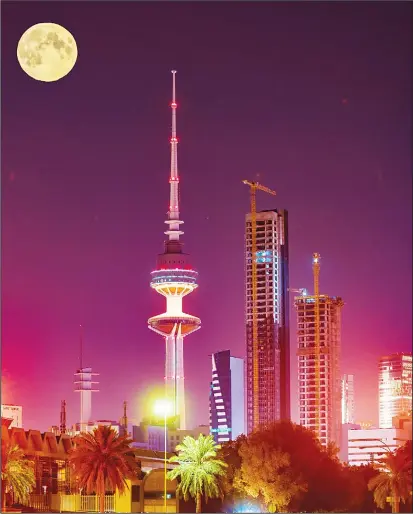  ??  ?? Full moon over Liberation Tower. – Saleh Aljufairah-KUNA