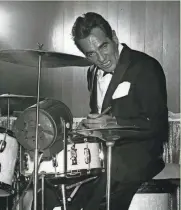  ??  ?? Gene Krupa thunders through a number on the opening night of a seven-day engagement at the Brass Rail.