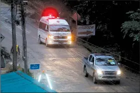  ?? AP/SAKCHAI LALIT ?? An ambulance in Mae Sai, Thailand, carries one of the boys rescued from a flooded undergroun­d cave to a hospital.