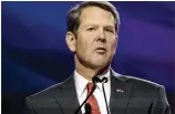  ??  ?? Republican candidate Brian Kemp, speaking Tuesday to the Georgia Chamber of Commerce in Macon, said he’s “a tell-it-like-it-is business guy” and pledged to carry on the governor’s legacy.