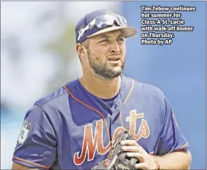  ??  ?? Tim Tebow continues hot summer for Class-A St. Lucie with walk-off homer on Thursday. Photo by AP