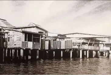  ??  ?? black-and-white images from the book capture the charming glory of the old waterfront houses in Kampong China. — Waterfront Heirlooms