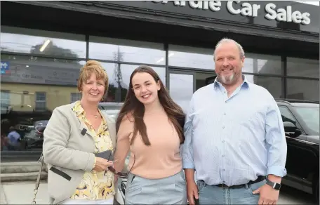  ??  ?? Ann McCabe with Roisin and Mark McArdle at the opening of Donal McArdle Car Sales.