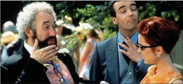  ??  ?? CONVERSION: John Hannah, centre, with Simon Callow and Charlotte Coleman in Four Weddings