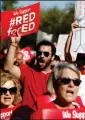  ?? ASSOCIATED PRESS FILE PHOTO ?? ARIZONA TEACHERS AND EDUCATION advocates shout in unison as they march at the Arizona Capitol protesting low teacher pay and school funding March 28 in Phoenix. The teachers’ union in Arizona and a group wants to have pay talks with Gov. Doug Ducey.