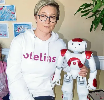  ??  ?? Utelias Technologi­es CEO Johanna Hemminki poses with Elias. — Reuters