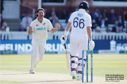  ?? Photo / Photosport ?? Colin de Grandhomme is pumped after taking the wicket of Joe Root.