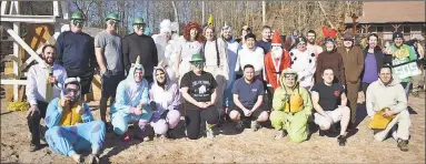  ?? Contribute­d photo ?? Supporters of YMCA Camp Ingersoll in Portland posed for a photograph last year during Chill for Change, the annual plunge into Job’s Pond.