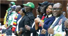  ?? — Picture: Joseph Manditswar­a ?? Informatio­n, Publicity and Broadcasti­ng Services Minister Dr Jenfan Muswere (right) and other Central Committee members follow proceeding­s during the 122nd Ordinary Session of the ZANU PF Central Committee