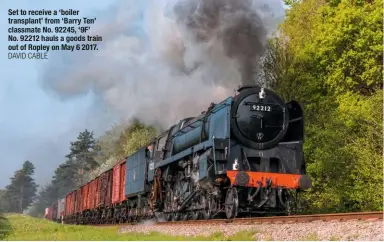  ?? DAVID CABLE ?? set to receive a ‘boiler transplant’ from ‘barry ten’ classmate no. 92245, ‘9f’ no. 92212 hauls a goods train out of ropley on may 6 2017.