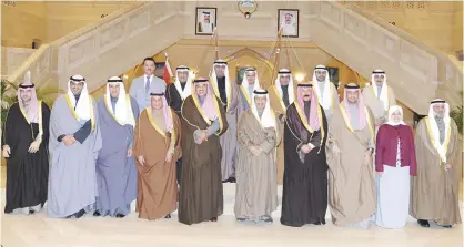  ?? — KUNA KUWAIT: Terror attacks ?? KUWAIT: His Highness the Prime Minister Sheikh Jaber Mubarak Al-Hamad Al-Sabah poses for a group photo with members of his new Cabinet.