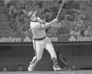  ?? Victor Decolongon Getty Images ?? MIKE TROUT belts his 41st home run to center off Chicago’s Lucas Giolito in the fifth inning.