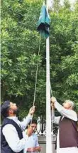  ?? Ahmed Ramzan/Gulf News ?? ■ Consul-General Brigadier (retired) Syed Javed Hassan raising the flag on National Day at Pakistan Consulate in Dubai.