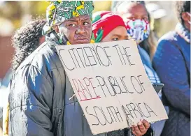  ?? Picture: Gallo Images/Sharon Seretlo ?? A protester outside the Roodepoort magistrate’s court in Gauteng this month as Mzikayise Malephane appeared for the murder of Tshegofats­o Pule.