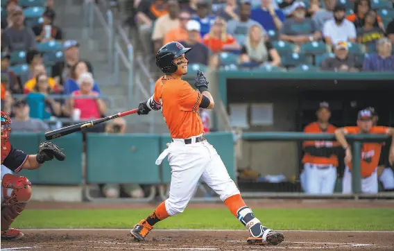  ?? Photos by Brian Baer / Special to The Chronicle ?? The River Cats’ Mauricio Dubon bats against Memphis in a losing effort. He has also played this season with TripleA San Antonio, where he hit 16 home runs.