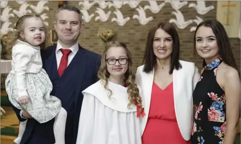  ??  ?? Kilcoole NS pupil Bryana Coughlan at her Confirmati­on in the Church of St Anthony, with Olivia, Niall, Charlotte and Lauryn Coughlan.