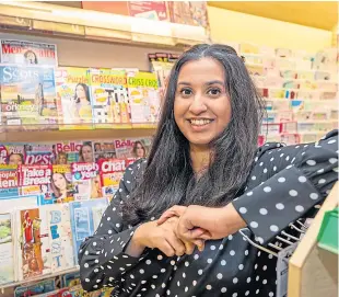  ?? Picture: Steve Brown. ?? Miriam Hussain delivered the presentati­on from her family’s convenienc­e store in Leslie, as a tribute to her parents.