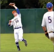  ?? BOB RAINES — DIGITAL FIRST MEDIA ?? Ambler’s Chris Kersey snags a Nor-Gwyn fly ball.