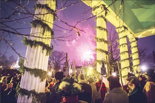  ??  ?? This undated photo provided by The Henry Ford Museum shows a fireworks finale during Holiday Nights in Greenfield Village at The Henry Ford Museum complex in Dearborn, Michigan,
with a lantern-lit procession of guests and carolers. (AP)