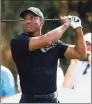  ?? Scott Audette / Associated Press ?? Tiger Woods tees off during the Pro-Am before the PNC Championsh­ip on Friday in Orlando.