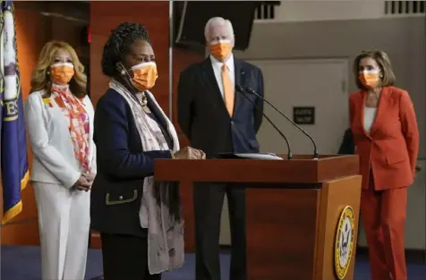  ?? J. Scott Applewhite/Associated Press ?? Rep. Sheila Jackson Lee, D-Texas, speaks to reporters as she is joined by, from left, Rep. Lucy McBath, D-Ga.; Rep. Mike Thompson, D-Calif., chairman of the House Gun Violence Prevention Task Force; and Speaker of the House Nancy Pelosi, DCalif., at a news conference on passage of gun violence prevention legislatio­n on March 11 at the Capitol in Washington.