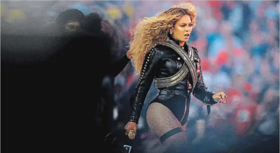  ?? RONALD MARTINEZ
GETTY ?? Beyoncé used her performanc­e during the Super Bowl 50 halftime show in 2016 to make a statement about Black Lives Matter.