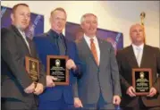  ?? MARIAN DENNIS – DIGITAL FIRST MEDIA ?? From left, West Pottsgrove Officer Robert Stoudt, Sgt. Steven Ziegler, Montgomery County District Attorney Kevin Steele and West Pottsgrove Detective Timothy Roeder. The three were awarded a commendati­on for their work on a gunpoint robbery...