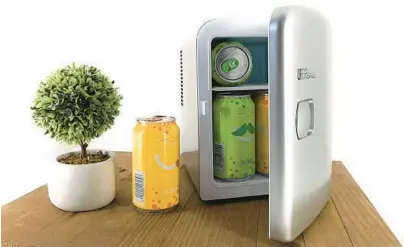  ?? AMAZON ?? The Uber Appliance Mini Fridge has a removable shelf and holds up to six cans or four bottles of water.