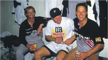  ?? PHOTOSPORT ?? Chris Harris, Jeff Wilson and Gavin Larsen celebrate an ODI win over Australia in Hamilton in 1993.