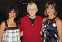  ??  ?? Yvette Wilkins,
from left, Bev Lewis and Melody Sye O’Reilly visit at the Razorback Foundation reception on Aug. 29.