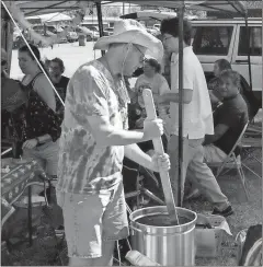  ?? File, Doug Walker / Rome News-Tribune ?? Bob Zakrzewski stirs Apocalypse Chili during last year’s Trout Unlimited Chili Cook-Off at Ridge Ferry Park.