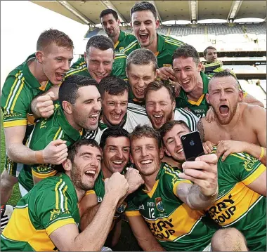  ??  ?? PIcture oF HAPPIness: Kerry take a selfie to mark their All-Ireland triumph last year; their star forward Kieran Donaghy (below); Brolly having the craic at the Austin Stacks club fundraiser (top right)