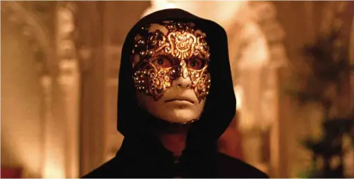  ??  ?? ABOVE: A masked reveller from Kubrick’s final film, Eyes Wide Shut. Conspiracy seekers see these scenes as evidence of the director’s inside knowledge of the Illuminati