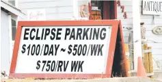 ??  ?? A parking sign for people visiting for the Solar Eclipse is shown in Depoe Bay, Oregon. — Reuters photos