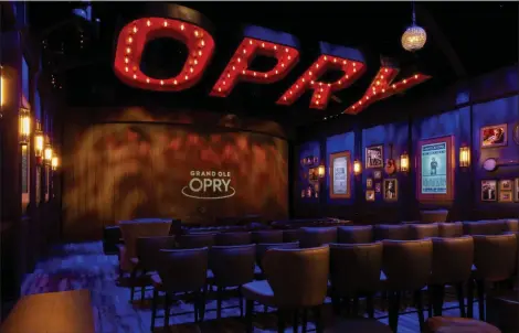  ?? PHOTO PROVIDE ?? DA photo released by the Grand Ole Opry shows the Circle Room, where a new immersive film explains the history of the Grand Ole Opry while showing video clips of over 100 different artists on stage.